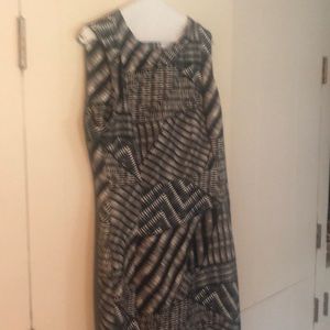 A one piece black and gray Calvin Kline dress.